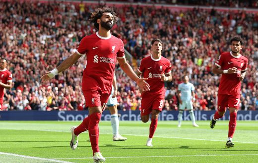 Mohamed Salah of Liverpool celebrates after scoring the team's second goal after scoring off the rebound of a missed penalty during the Premier League match between Liverpool FC and AFC Bournemouth 
Image credit: Getty Images