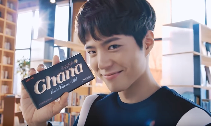 South Korean Actor Park Bo Gum holding a Ghana brand chocolate