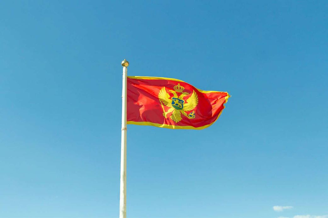 The Montenegrin flag via rjtravelagency.com