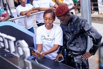 1Allo Danny observes a live demo using the Tecno CAMON 40