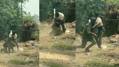 Soldier struggles for freedom as civilian pins him to the ground during scuffle (video)