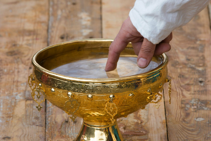 Temple goers drink AC water, believing it is sacred