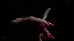 Symbolic picture of woman smoking. AP Photo/Carolyn Kaster