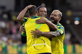 Ronaldinho hugging Kevin Prince Boateng
