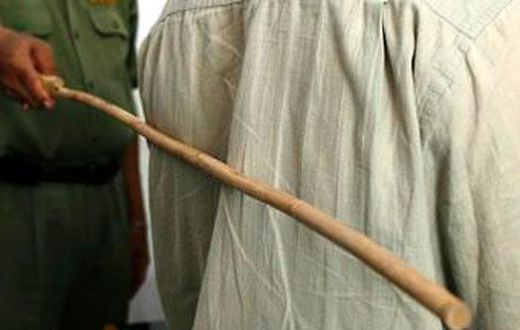 A person receiving strokes of cane [Tribune Online]