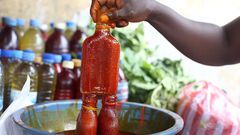 Palm oil seller [Africa Is a Country]