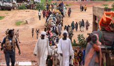 This August 2023 photo shows sudanese people, who fled the conflict in Murnei in Sudan's Darfur region, crossing the border between Sudan and Chad. Zohra Bensemra/Reuters