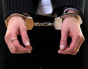 File photo: Woman in handcuffs