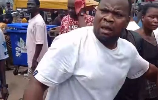 Angry trader at Adum market