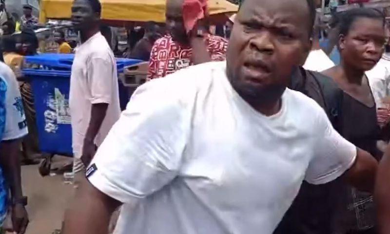 Angry trader at Adum market