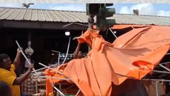 Traders’ canopy under traffic light demolished