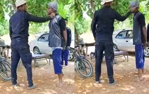 A police officer assaulting a suspected