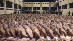 Inmates are lined up during a security operation at the Izalco prison in San Salvador, El Salvador, on April 25, 2020. El Salvador Presidency Press Office / AP