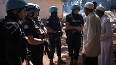 Jordanians peacekeepers meet Muslim refugees at an internally displaced persons camp in Bangassou on October 25, 2017