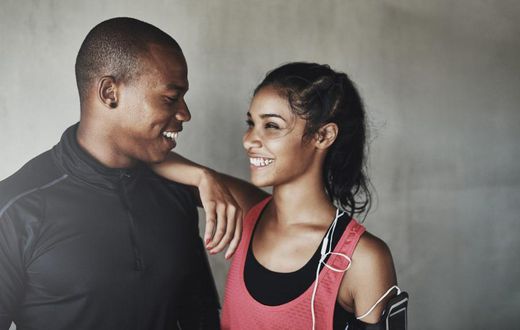 Man and woman smiling happily