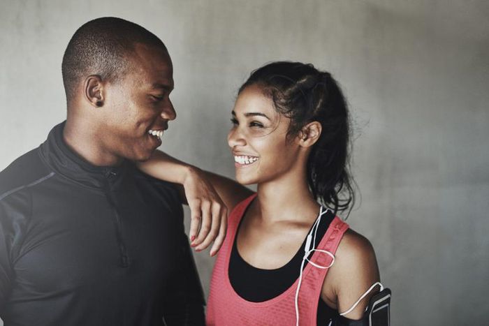 Man and woman smiling happily