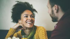 Happy woman on a date [Credit everyday feminism]