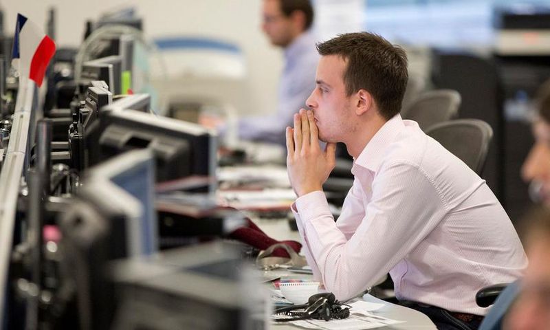 A trader looks at his screen on the IG Group trading floor in London March 18, 2013. IG is a major CFD provider.