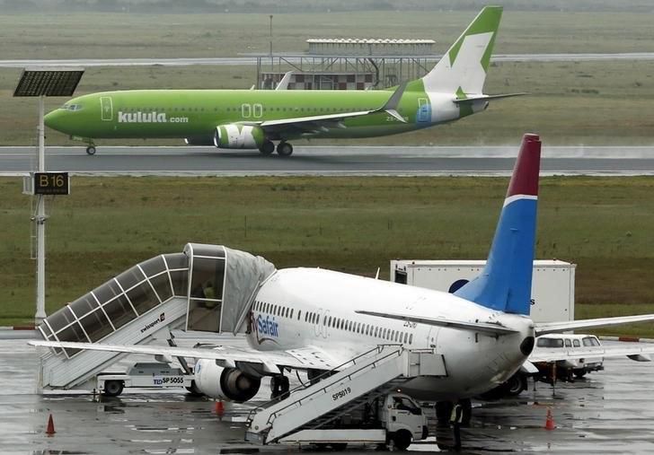 An aircraft from South African low cost airline Kulula takes off from Cape Town International airport September 15, 2015.  REUTERS/Mike Hutchings