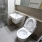 The bathrooms are simple and modern-looking, but hey, at least they're not leaking!