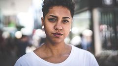 Woman stares blankly into space [Credit: All This]