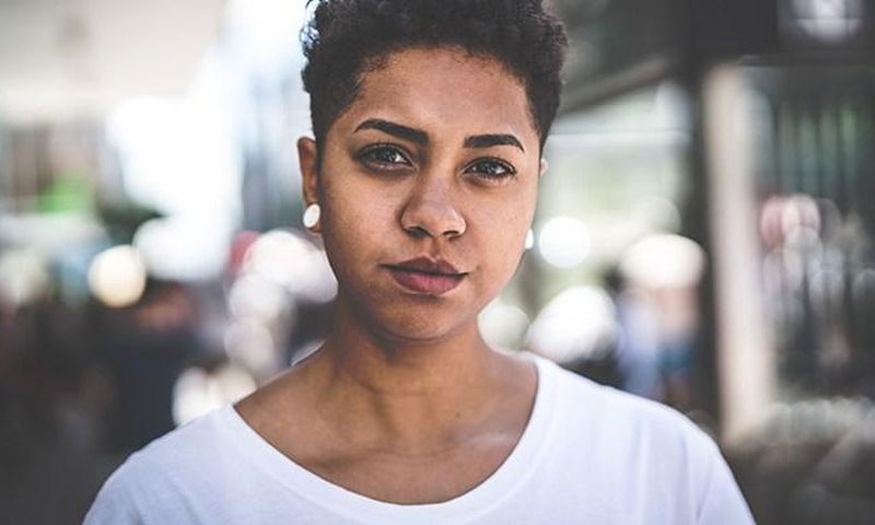 Woman stares blankly into space [Credit: All This]