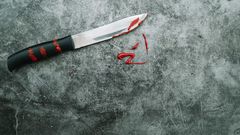 knife-with-artificial-blood-stone-desk