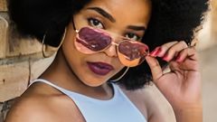 A woman wearing trendy glasses