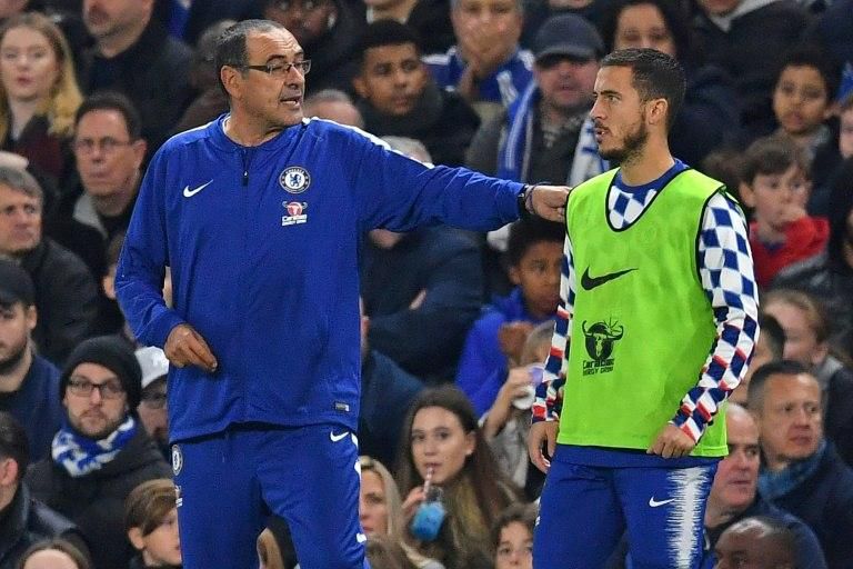 Immediate impact: The second-half introduction of Eden Hazard (right) by Maurizio Sarri (left) swung the game Chelsea's way