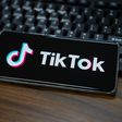 Illustration of TikTok logo displayed on the screen of a smartphone.Getty Images