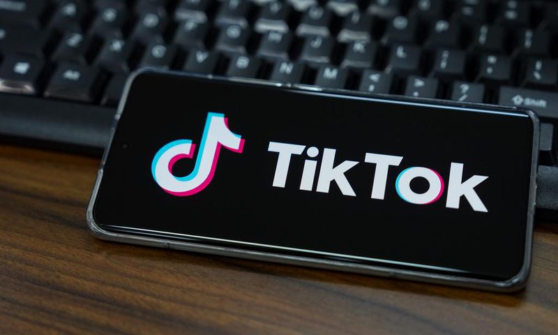 Illustration of TikTok logo displayed on the screen of a smartphone.Getty Images