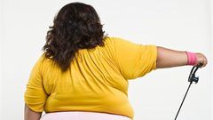 Back of a plus sized black woman [Masterfile]