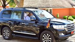 President Museveni driving