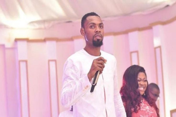 Rev Obofour with wife in church