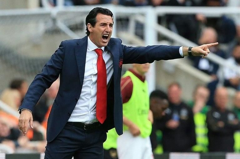 Arsenal coach Unai Emery shouts instructions from the touchline at St James' Park on Saturday