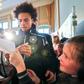Manchester City winger Leroy Sane (C) signs autographs after Germany's stars held a press conference at a school in Leipzig on Tuesday in which school children were also allowed to ask questions ahead of the friendly against Russia on Thursday.