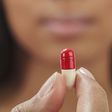 Woman Taking Pill