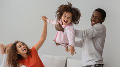 A cheerful mother, father and their children