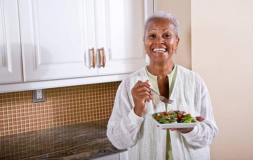 Old Woman eating [iStock]