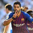 Luis Suarez scored the first of Barcelona's two goals in three minutes