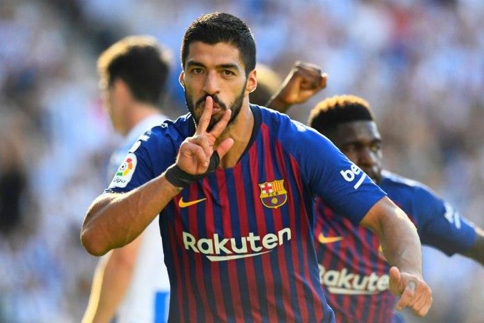 Luis Suarez scored the first of Barcelona's two goals in three minutes
