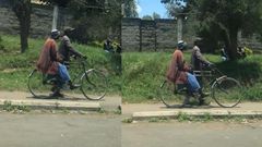 Elderly man taking his sick wife to the hospital on a bicycle sparks reactions
