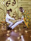 Okyeame Kwame play draughts with son