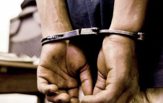 A man in handcuffs