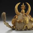 A ceremonial cap worn by courtiers at coronations is among the items that will be loaned back to Ghana
