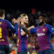 Barcelona defender Samuel Umtiti (R) congratulates Spanish team-mate Gerard Pique for his equaliser in a 202 draw with Gerona.
