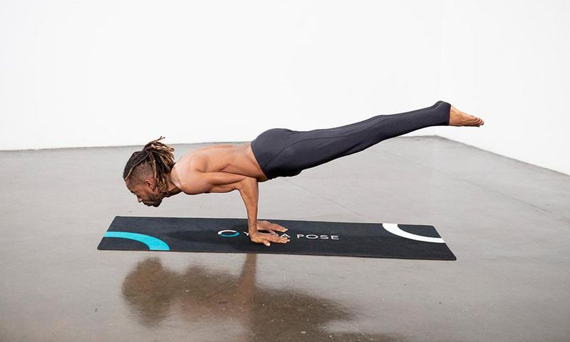 The peacock pose [yogadaily]