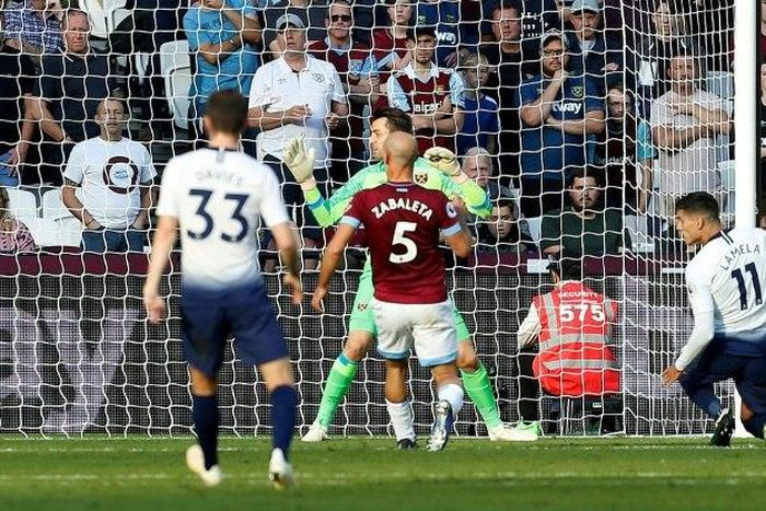 Erik Lamela stoops to head Tottenham's winner at West Ham