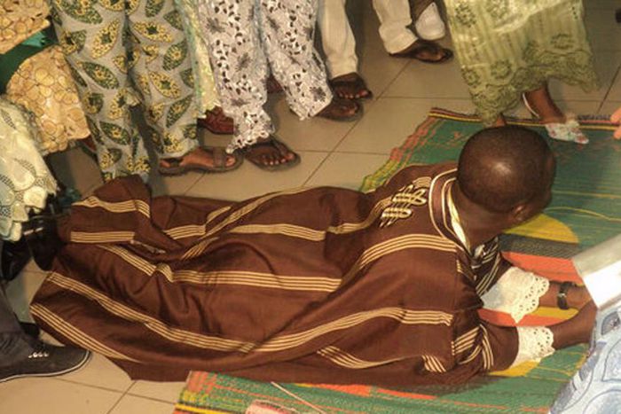 Kneeling to greet [Guardiannigeria]