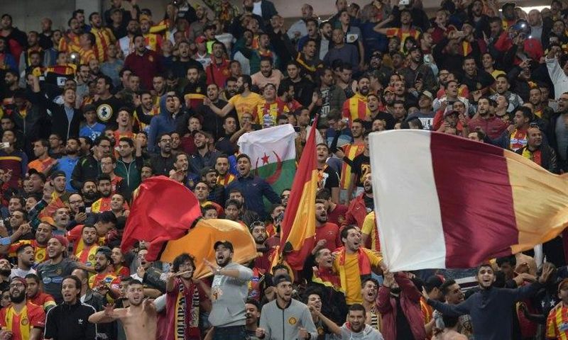 ES Tunis fans cheer for their team prior to the CAF Champions League second leg final football match between Egypt's Al-Ahly and Tunisia's ES Tunis at the Olympic stadium in Rades on November 9, 2018